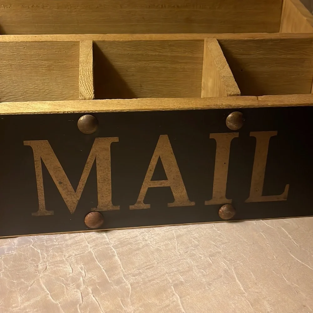 Mail wooden organizer- slanted up. Has 4 sections & says mail on front w/tacks